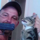 Illustration for article titled Florida Man Holds Gun to Cats Head and Posts Picture to Facebook